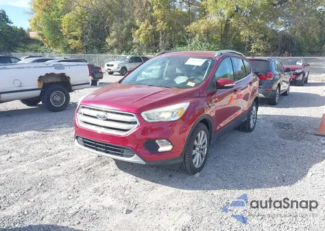 2017 Ford Escape Titanium from USA, damaged, VIN 1FMCU9J95HUD45740